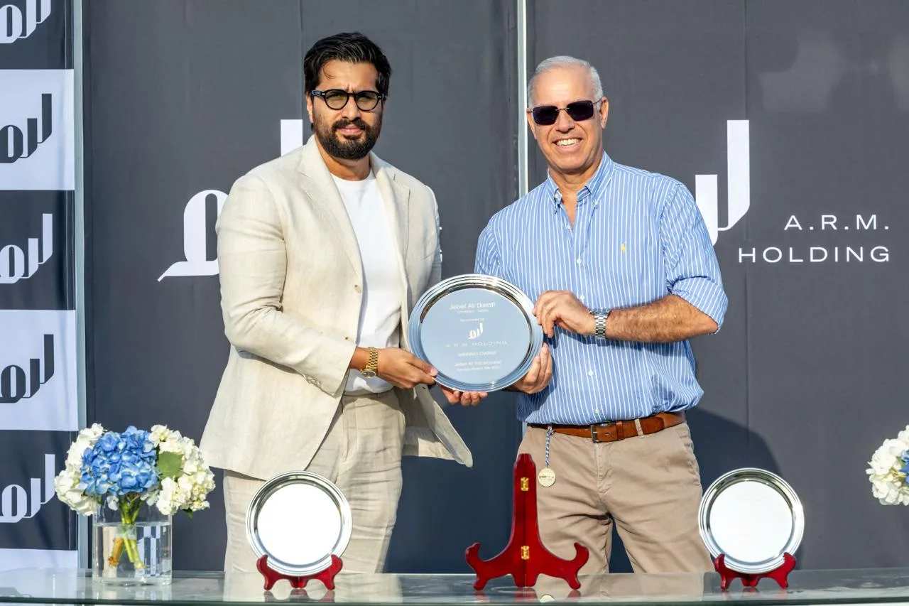 Antonio Cintra collecting the winning owner's plate for the Jebel Ali Distaff